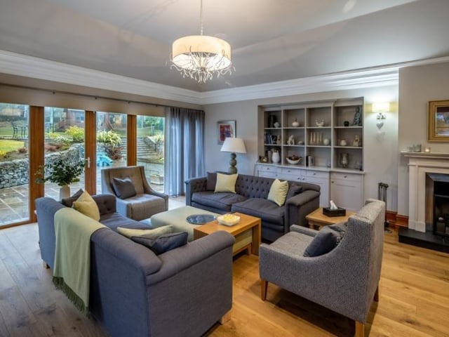 Garden room with patio doors onto the sheltered terrace.