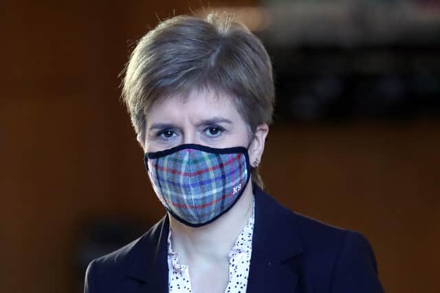 First Minister Nicola Sturgeon in the Scottish Parliament at Holyrood in Edinburgh, before a First Minister's statement outlining further coronavirus restrictions for Scotland.