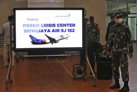 Indonesian soldiers at a crisis centre set up at Jakarta Airport after the flight went missing. Picture: Tatan Syuflana/AP
