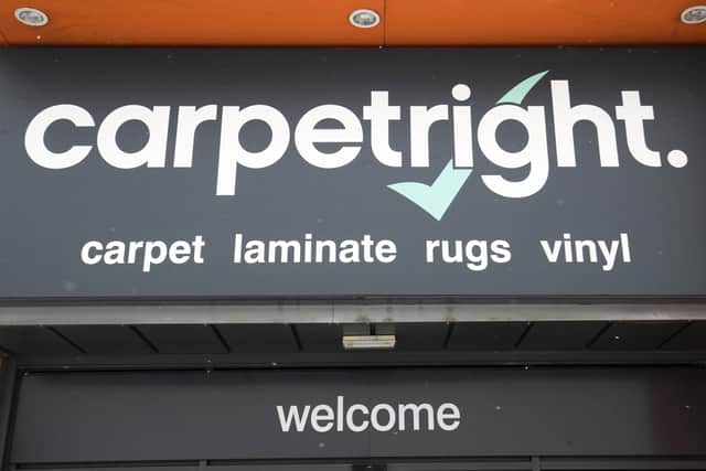 Carpetright has been bought in a rescue deal by rival Tapi, but will shut more than 200 stores and cut more than 1,000 jobs.