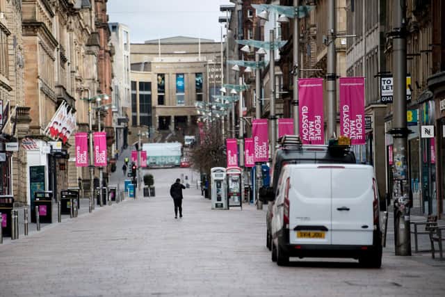 An almost empty Buchanan Street in the centre of Glasgow as people observe the spring 2020 lockdown. Non-essential stores have been forced to close for months now under tighter restrictions, hammering trade, but industry leaders are hoping for a lift from April 26. Picture: John Devlin