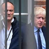 Britain's Prime Minister Boris Johnson (right) and his former special advisor Dominic Cummings leave from the rear of Downing Street in central London. The photo was taken on September 3, 2019, while Mr Cummings was still in post. Picture: Daniel Leal/AFP via Getty Images
