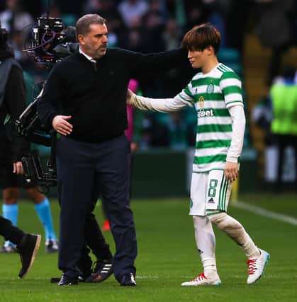 Celtic manager Ange Postecoglou congratulates Kyogo Furuhashi as he leaves the field after his goal that set the Parkhead side up for their 2-0 victory over Ferencvaros. (Photo by Craig Williamson / SNS Group)