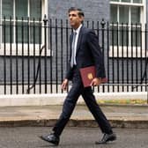 Rishi Sunak arrives to make a speech outside 10 Downing Street, London, after meeting King Charles III and accepting his invitation to become Prime Minister and form a new government