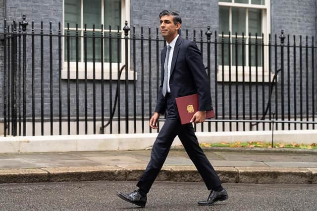 Rishi Sunak arrives to make a speech outside 10 Downing Street, London, after meeting King Charles III and accepting his invitation to become Prime Minister and form a new government