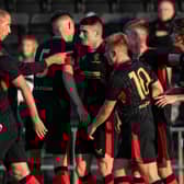 Nikola Katic, left, congratulates Jake Hastie after the latter's goal against Dumbarton