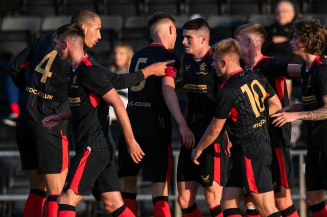 Nikola Katic, left, congratulates Jake Hastie after the latter's goal against Dumbarton