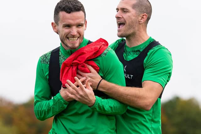 Paul McGinn and Alex Gogic have been key to Hibs' defensive resolve. Photo by Ross MacDonald / SNS Group