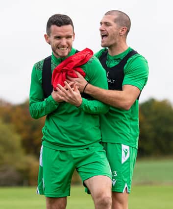 Paul McGinn and Alex Gogic have been key to Hibs' defensive resolve. Photo by Ross MacDonald / SNS Group