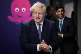 Former prime minister Boris Johnson, flanked by his then-Chancellor Rishi Sunak. Picture: PA