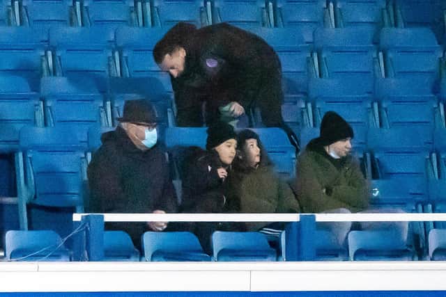 George Galloway pictured at the Queen of the South match against Dundee with his family. Pic: SNS Group