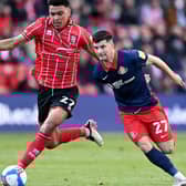 Jordan Jones of Sunderland battles for possession with Morgan Rogers of Lincoln City  during the Sky Bet League One Play-off Semi Final 1st Leg match between Lincoln City and Sunderland. (Photo by Laurence Griffiths/Getty Images)