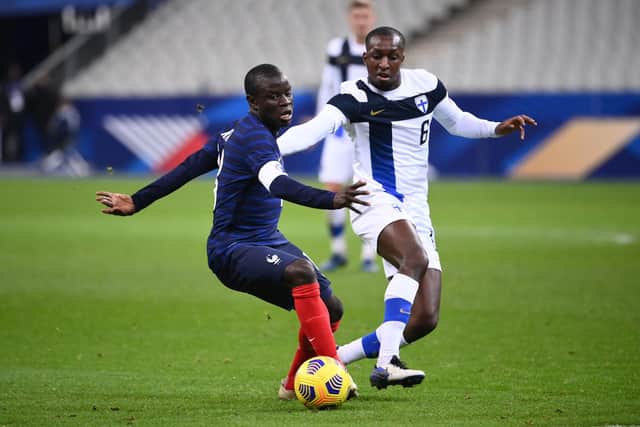 France midfielder N'Golo Kante (L) vies for the ball with Finland's midfielder Glen Kamara during the friendly football match between France and Finland at the Stade de France in Saint-Denis, Paris outskirts, on November 11, 2020. Photo by FRANCK FIFE/AFP via Getty Images