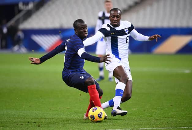 France midfielder N'Golo Kante (L) vies for the ball with Finland's midfielder Glen Kamara during the friendly football match between France and Finland at the Stade de France in Saint-Denis, Paris outskirts, on November 11, 2020. Photo by FRANCK FIFE/AFP via Getty Images