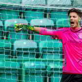 Kevin Dabrowski in action for Hibs against Arsenal at Easter Road