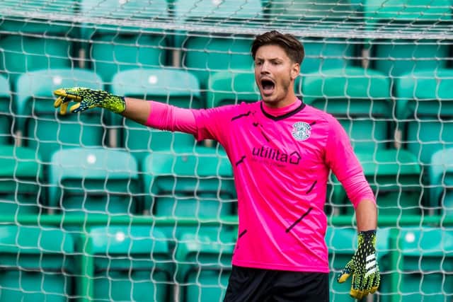 Kevin Dabrowski in action for Hibs against Arsenal at Easter Road