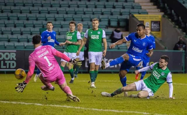 Alfredo Morelos mkes the breakthrough for Rangers at Easter Road as he guides a shot beyond Hibs goalkeeper Ofir Marciano. (Photo by Craig Williamson / SNS Group)