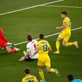 Harry Kane opens the scoring for England against Ukraine.
