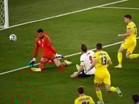 Harry Kane opens the scoring for England against Ukraine.