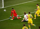 Harry Kane opens the scoring for England against Ukraine.