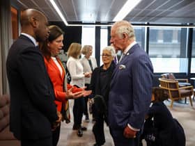 BBC journalists Clive Myrie and Lyse Doucet meet King Charles, then Prince of Wales, in April this year (Picture: Hannah McKay/WPA pool/Getty Images)