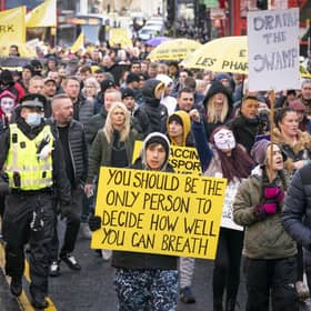 People take part in the "Freedom Rally" an anti-vaccine demonstration organised by the campaign group 'Scotland Against Lockdown' in Glasgow city centre. (Picture credit: Jane Barlow/PA Wire)