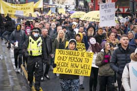 People take part in the "Freedom Rally" an anti-vaccine demonstration organised by the campaign group 'Scotland Against Lockdown' in Glasgow city centre. (Picture credit: Jane Barlow/PA Wire)