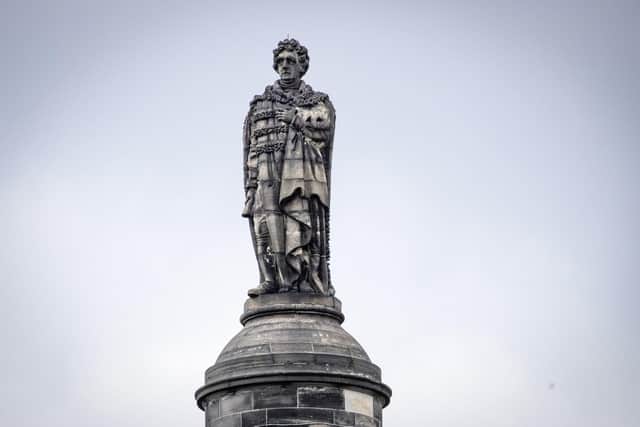 The statue of Henry Dundas 1st Viscount Melville on top of a 150ft column, known as the Melville Monument, stands in St Andrews Square, Edinburgh.