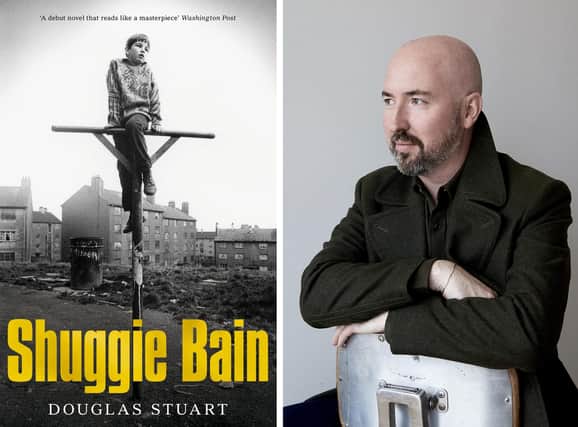 Douglas Stuart with the cover of his book, Shuggie Bain, which has been named on the 13-strong 2020 Booker Prize for Fiction longlist (Picture: 2020 Booker Prize/Clive Smith/PA Wire)