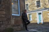 Ian Rankin outside the Oxford Bar, Edinburgh
