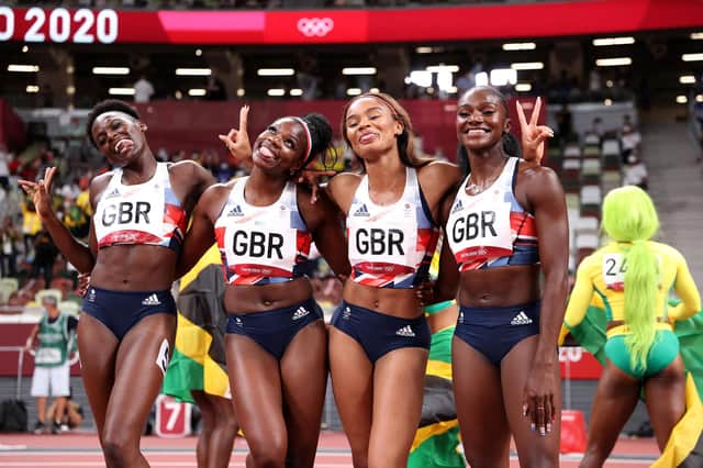 Asha Philip, Imani Lansiquot, Dina Asher-Smith and Daryll Neita celebrate winning bronze