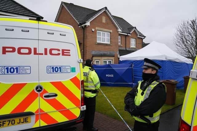 Officers outside the home of Nicola Sturgeon and her husband Peter Murrell in April