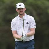 Connor Syme sizes up a shot in the opening round of the SDC Championship at St Francis Links in South Africa. Picture: Warren Little/Getty Images.