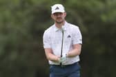 Connor Syme sizes up a shot in the opening round of the SDC Championship at St Francis Links in South Africa. Picture: Warren Little/Getty Images.