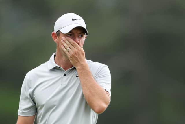 Rory McIlroy reacts to missing a putt on the 18th green during the second round at Augusta National Golf Club. Picture: Christian Petersen/Getty Images.