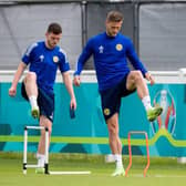 Leeds United defender Liam Cooper (right) pictured during a Scotland training session at Rockliffe Park. (Photo by Ross Parker / SNS Group)