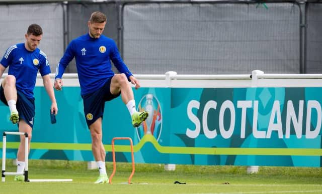 Leeds United defender Liam Cooper (right) pictured during a Scotland training session at Rockliffe Park. (Photo by Ross Parker / SNS Group)