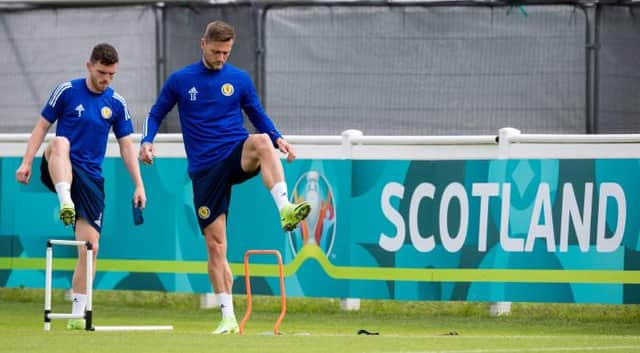 Leeds United defender Liam Cooper (right) pictured during a Scotland training session at Rockliffe Park. (Photo by Ross Parker / SNS Group)