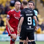 Aberdeen's Scott Brown remonstrates with Livingston's Bruce Anderson.