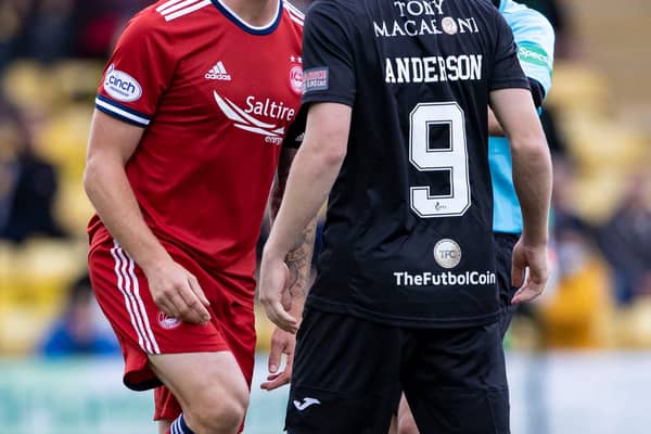Aberdeen's Scott Brown remonstrates with Livingston's Bruce Anderson.