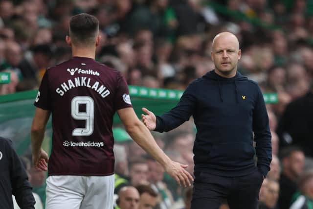 Manager Steven Naismith greets Lawrence Shankland after taking the skipper off in Hearts' 2-0 defeat to Celtic (Photo by Ross MacDonald / SNS Group)