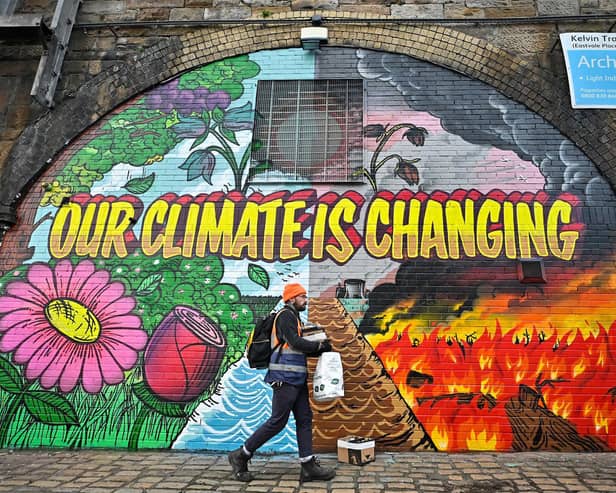 A mural painted in Glasgow near where the COP26 climate summit was held spoke of the urgency for real action. Picture: Jeff J Mitchell/Getty Images