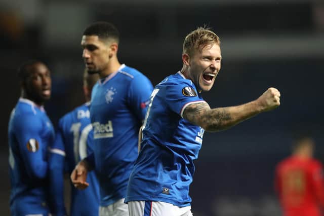 Scott Arfield celebrates putting Rangers in front in the seventh minute of their Europa League Group D match against Benfica at Ibrox. (Photo by Ian MacNicol/Getty Images)