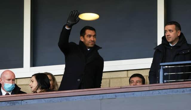 New Rangers' manager Giovanni van Bronckhorst takes his seat during a Premier Sports Cup semi-final match between Rangers and Hibernian at Hampden Park, on November 21, 2021, in Glasgow, Scotland. (Photo by Craig Williamson / SNS Group)