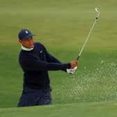 Tiger Woods hits of a bunker on the practice area at Augusta National in the build up to The Masters. Picture: Andrew Redington/Getty Images.