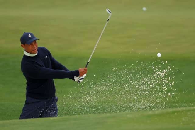 Tiger Woods hits of a bunker on the practice area at Augusta National in the build up to The Masters. Picture: Andrew Redington/Getty Images.