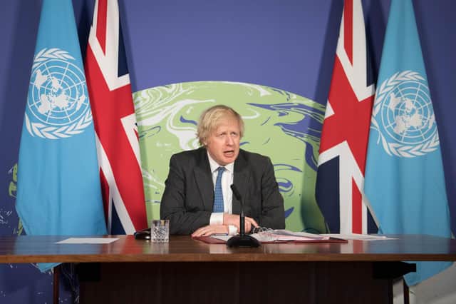 Prime Minister Boris Johnson chairs a session of the UN Security Council on climate and security at the Foreign, Commonwealth and Development Office in February (Getty Images)