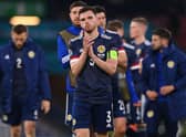 Scotland captain Andy Robertson acknowledges the home fans after the Euro 2020 finals campaign was ended by a 3-1 defeat against Croatia at Hampden on June 22, 2021. (Photo by STU FORSTER/POOL/AFP via Getty Images)