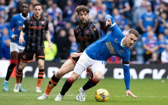 Aaron Ramsey in action for Rangers against Dundee United's Charlie Mulgrew at Ibrox on Sunday. (Photo by Alan Harvey / SNS Group)