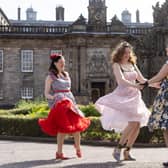 Holyrood Club dressed in 1950s clothes pose around Holyrood Palace,Edinburgh   Photograph: David Cheskin